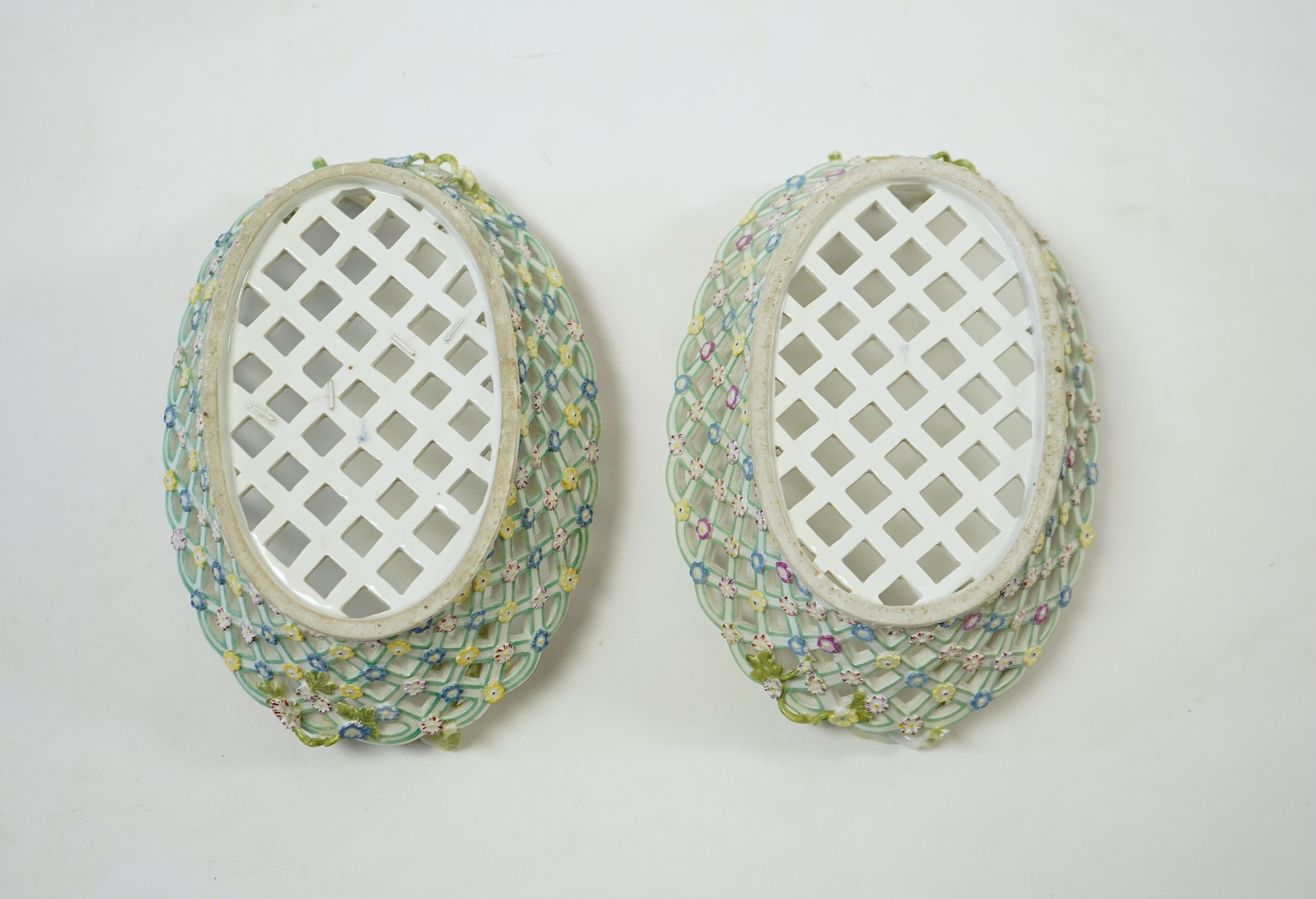 A pair of mid 18th century Meissen porcelain reticulated baskets c.1765